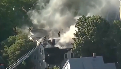 Police officer, off-duty firefighter help residents escape from burning triple-decker