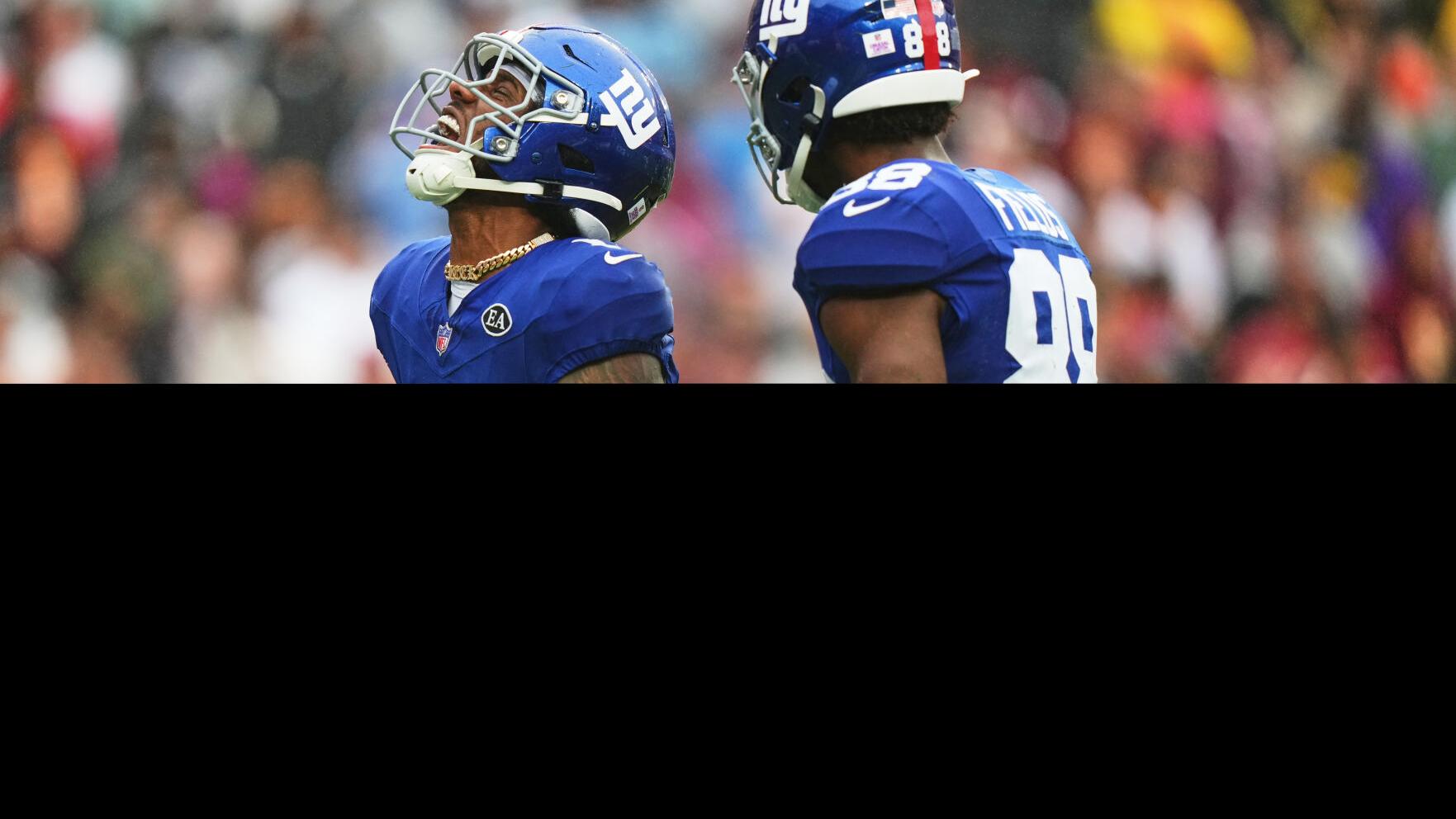 APTOPIX Giants Commanders Football