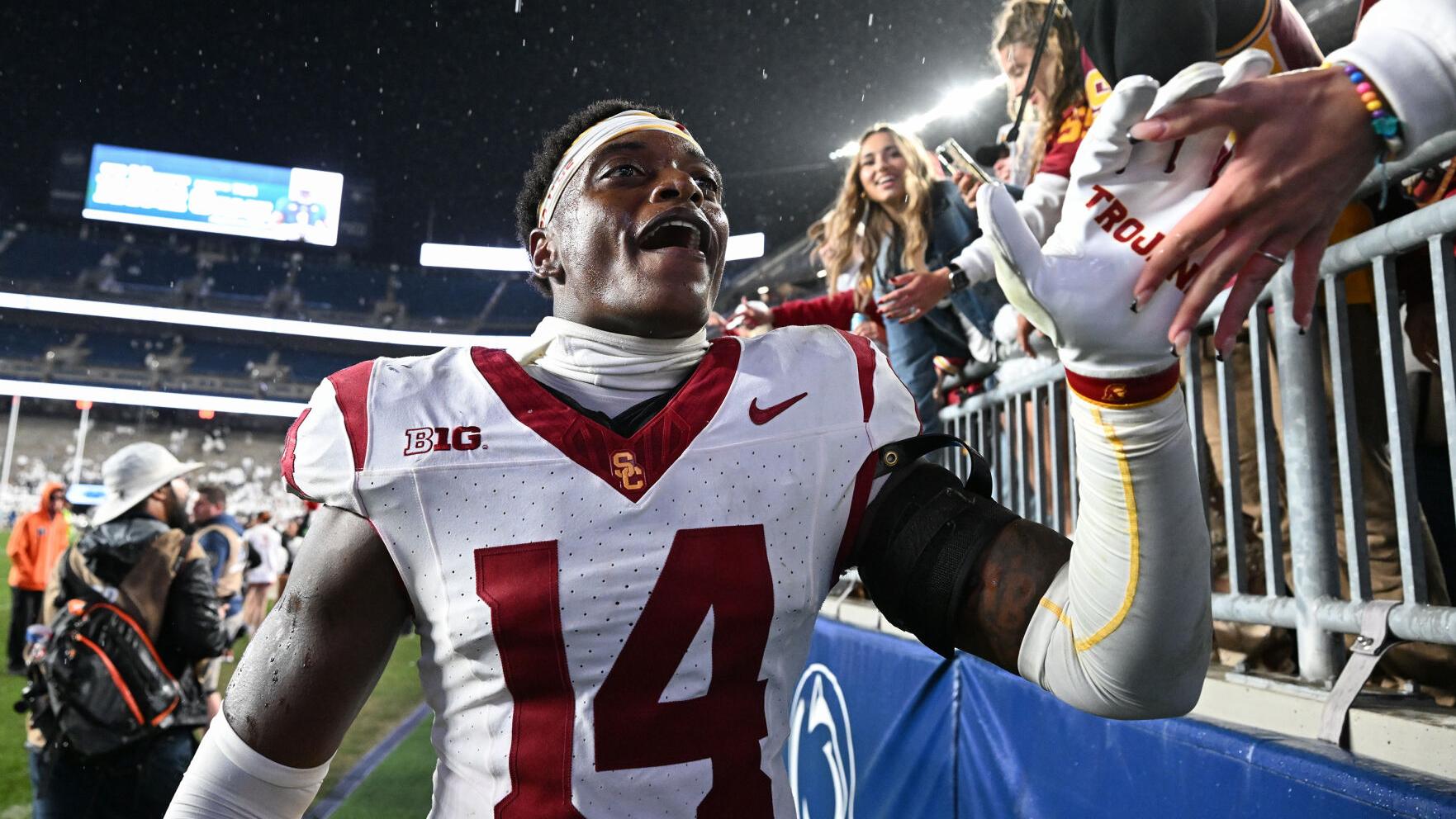 CORRECTION USC Penn St Football